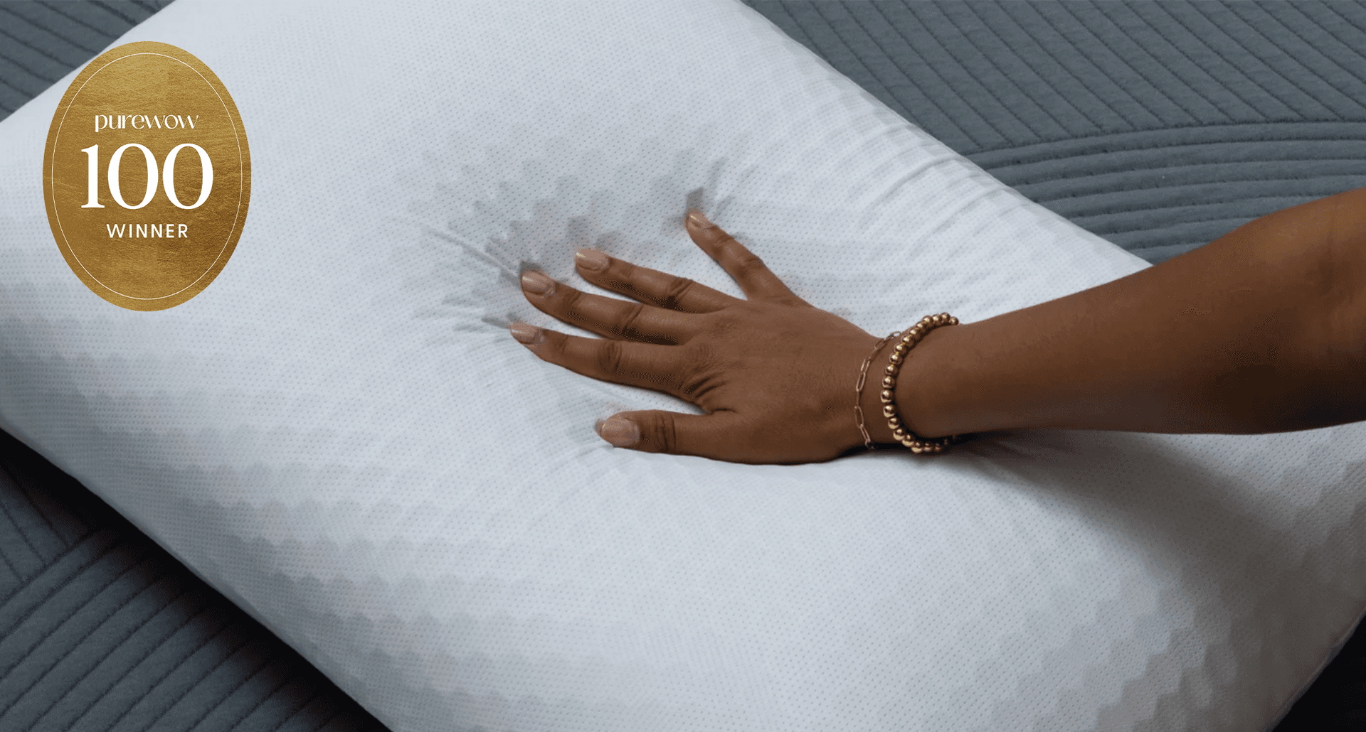 purple pillow squished by hand